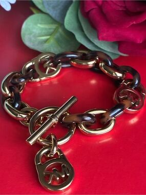 Michael Kors Gold and Tortoiseshell Chain Bracelet with MK Charms 7”
